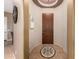 Foyer with circular mosaic tile inset, art niche, and decorative ceiling detail at 16538 E Westwind Ct # 51, Fountain Hills, AZ 85268