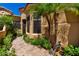 Exterior view of a home with desert landscaping and a curved architectural design at 16538 E Westwind Ct # 51, Fountain Hills, AZ 85268