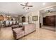 Spacious living room with open floor plan, tile flooring, and views of the dining area at 16538 E Westwind Ct # 51, Fountain Hills, AZ 85268