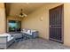 Covered patio with modern patio furniture and a view of the golf course at 16538 E Westwind Ct # 51, Fountain Hills, AZ 85268