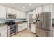 Modern kitchen featuring stainless steel appliances and a double oven at 1705 W Lark Dr, Chandler, AZ 85286
