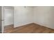 Laminate wood floor in an empty bedroom at 1730 W Emelita Ave # 2033, Mesa, AZ 85202