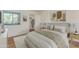 Cozy bedroom with a comfortable bed, bright window, and walk in closet space at 1730 W Emelita Ave # 2033, Mesa, AZ 85202