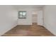 Empty bedroom with wood laminate flooring and closet at 1730 W Emelita Ave # 2033, Mesa, AZ 85202