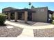 Exterior of a clubhouse with a pergola and manicured landscaping at 1730 W Emelita Ave # 2033, Mesa, AZ 85202