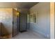 Private entryway featuring a secure gate, covered area, and direct access to the home at 1730 W Emelita Ave # 2033, Mesa, AZ 85202