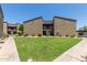Inviting apartment complex showcasing well-maintained lawns and convenient access to units at 1730 W Emelita Ave # 2033, Mesa, AZ 85202