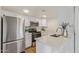 Bright, upgraded kitchen featuring stainless steel appliances and stylish countertops at 1730 W Emelita Ave # 2033, Mesa, AZ 85202
