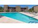 Exterior view of the community pool and lounge area at 1730 W Emelita Ave # 2033, Mesa, AZ 85202