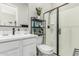 Bathroom featuring a black shower, sleek vanity with black faucet, and neutral color scheme at 17980 W Meadowbrook Ave, Goodyear, AZ 85395