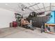 Spacious garage featuring custom storage solutions, tools, and plenty of space at 17980 W Meadowbrook Ave, Goodyear, AZ 85395