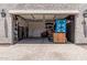 Organized two-car garage featuring abundant shelving and work area at 17980 W Meadowbrook Ave, Goodyear, AZ 85395