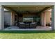 Outdoor patio with comfortable seating, perfect for relaxation and entertaining at 17980 W Meadowbrook Ave, Goodyear, AZ 85395