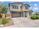 Beautiful two-story home with well manicured lawn, complemented by a two car garage at 1800 S Jesse Pl, Chandler, AZ 85286
