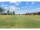 Expansive green space for recreation and relaxation in a serene neighborhood setting at 1800 S Jesse Pl, Chandler, AZ 85286
