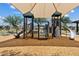 Community playground with multiple slides and play structures, offering fun for of all ages at 1800 S Jesse Pl, Chandler, AZ 85286