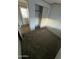 Secondary bedroom features a carpeted floor, closet, and access to the hallway at 201 S Greenfield Rd # 118, Mesa, AZ 85206