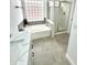 Bathroom featuring a bathtub, separate shower, modern vanity, and neutral tile flooring at 20917 N 37Th Pl, Phoenix, AZ 85050