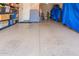 Clean garage with an epoxy floor, providing a durable and low-maintenance surface at 22851 S 229Th Pl, Queen Creek, AZ 85142