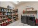 Spacious pantry with rows of shelving perfect for organizing food and household supplies at 22851 S 229Th Pl, Queen Creek, AZ 85142