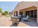 Charming outdoor patio with a cozy seating area perfect for enjoying warm days at 22851 S 229Th Pl, Queen Creek, AZ 85142