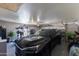 Spacious garage featuring an exercise station, ample storage, and a sleek black vehicle at 3611 E Dartmouth Cir, Mesa, AZ 85205