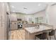 Well-lit kitchen featuring granite counters, stainless appliances, and plenty of cabinet space, designed for culinary enthusiasts at 3611 E Dartmouth Cir, Mesa, AZ 85205