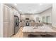 Modern kitchen with stainless steel appliances, stone countertops, and lots of cabinet storage at 3611 E Dartmouth Cir, Mesa, AZ 85205