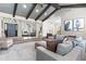 Spacious living room with stylish furnishings and large windows offers a comfortable and inviting space for relaxation and entertainment at 3611 E Dartmouth Cir, Mesa, AZ 85205