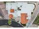 Aerial view showing roof of an estate home with red tile details, multiple air conditioning units, and white roofing at 3800 E Lincoln Dr # 54, Phoenix, AZ 85018