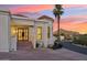 Close-up of the entrance with a stylish door, steps, and mountain views in the background at 3800 E Lincoln Dr # 54, Phoenix, AZ 85018