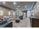 Cozy living room with a large sectional sofa and modern decor at 3800 E Lincoln Dr # 54, Phoenix, AZ 85018
