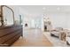 Spacious, bright sitting area with wood floors, fireplace, wet bar, and ample natural light provides a warm, inviting space at 3800 E Lincoln Dr # 54, Phoenix, AZ 85018