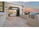 View of the mountain and patio with a stainless steel BBQ and outdoor access to a living room with a fireplace at 3800 E Lincoln Dr # 54, Phoenix, AZ 85018