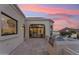 Exterior patio area with tile flooring and stainless steel grill overlooking the scenic mountain landscape at 3800 E Lincoln Dr # 54, Phoenix, AZ 85018