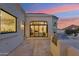 Outdoor patio with tile flooring, mountain views, and a stainless steel grill perfect for entertaining at 3800 E Lincoln Dr # 54, Phoenix, AZ 85018