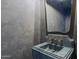 Chic powder room with a stylish vanity and a unique sink fixture at 3800 E Lincoln Dr # 54, Phoenix, AZ 85018