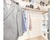 Organized walk-in closet with shelving, hanging rods, and ample storage space for clothing and accessories at 3828 N Rosewood Ave, Avondale, AZ 85392