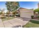 Beautifully maintained single-Gathering home with a two-car garage and mature landscaping at 3828 N Rosewood Ave, Avondale, AZ 85392