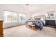 Bright main bedroom boasting large windows, carpet, and natural light at 3828 N Rosewood Ave, Avondale, AZ 85392