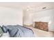 Bright main bedroom with a ceiling fan and natural light at 3828 N Rosewood Ave, Avondale, AZ 85392