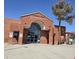 Garden Lakes - A School of Excellence - a well maintained, single story brick school on a clear day at 3828 N Rosewood Ave, Avondale, AZ 85392