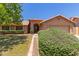 Charming single-story home showcasing manicured landscaping and a welcoming front entrance at 408 W Stacey Ln, Tempe, AZ 85284