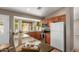 Well-lit kitchen with granite countertops, stainless steel appliances, and a view from the bay window at 408 W Stacey Ln, Tempe, AZ 85284