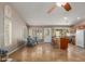 Living space featuring an open layout with tile floors, natural light, and eat in kitchen at 408 W Stacey Ln, Tempe, AZ 85284
