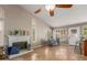 Comfortable living space features a fireplace, tile flooring, and views into the back yard at 408 W Stacey Ln, Tempe, AZ 85284