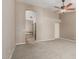 The main bedroom features carpet flooring, a ceiling fan, ensuite bath and closet at 408 W Stacey Ln, Tempe, AZ 85284