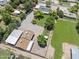Expansive property featuring a well-maintained lawn, gravel area, garden, and other structures at 4212 W Tierra Buena Ln, Phoenix, AZ 85053