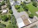 Aerial view of a large backyard with mature trees, gravel area, a garden and a private residential setting at 4212 W Tierra Buena Ln, Phoenix, AZ 85053