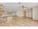 Spacious living room with tile floors, recessed lighting, and stone fireplace for a warm and inviting space at 4212 W Tierra Buena Ln, Phoenix, AZ 85053